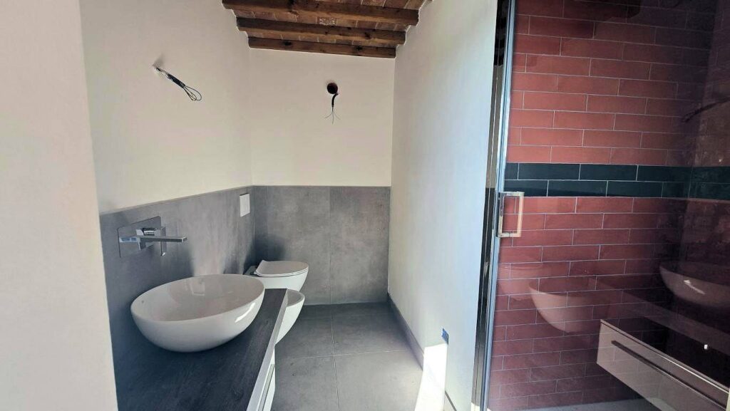 1608-Porzione terratetto di villa bifamiliare con giardino privato e piscina condominiale-Lajatico-25 Agenzia Immobiliare ASIP