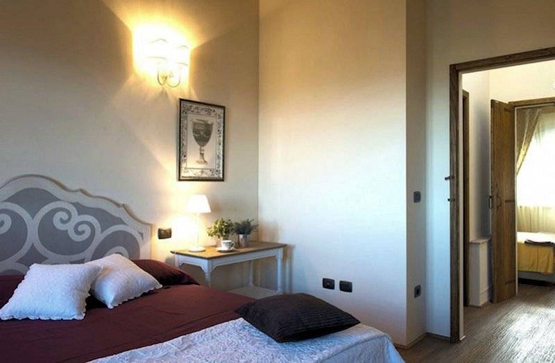 1291-Porzione terratetto di villa bifamiliare con giardino privato e piscina condominiale-Chianni-10 Agenzia Immobiliare ASIP