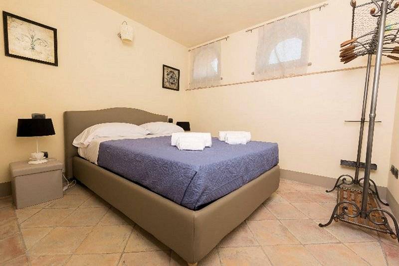 1293-Porzione terratetto di villa bifamiliare con giardino privato e piscina condominiale-Chianni-6 Agenzia Immobiliare ASIP